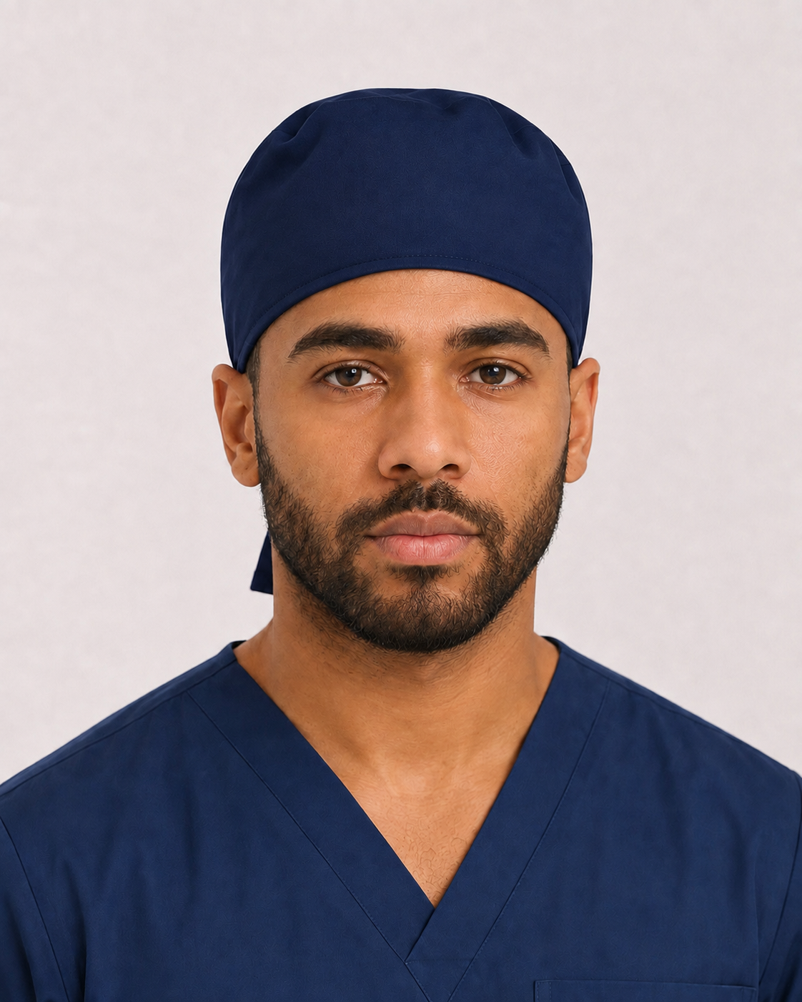 Solid navy satin-lined surgical cap, front view